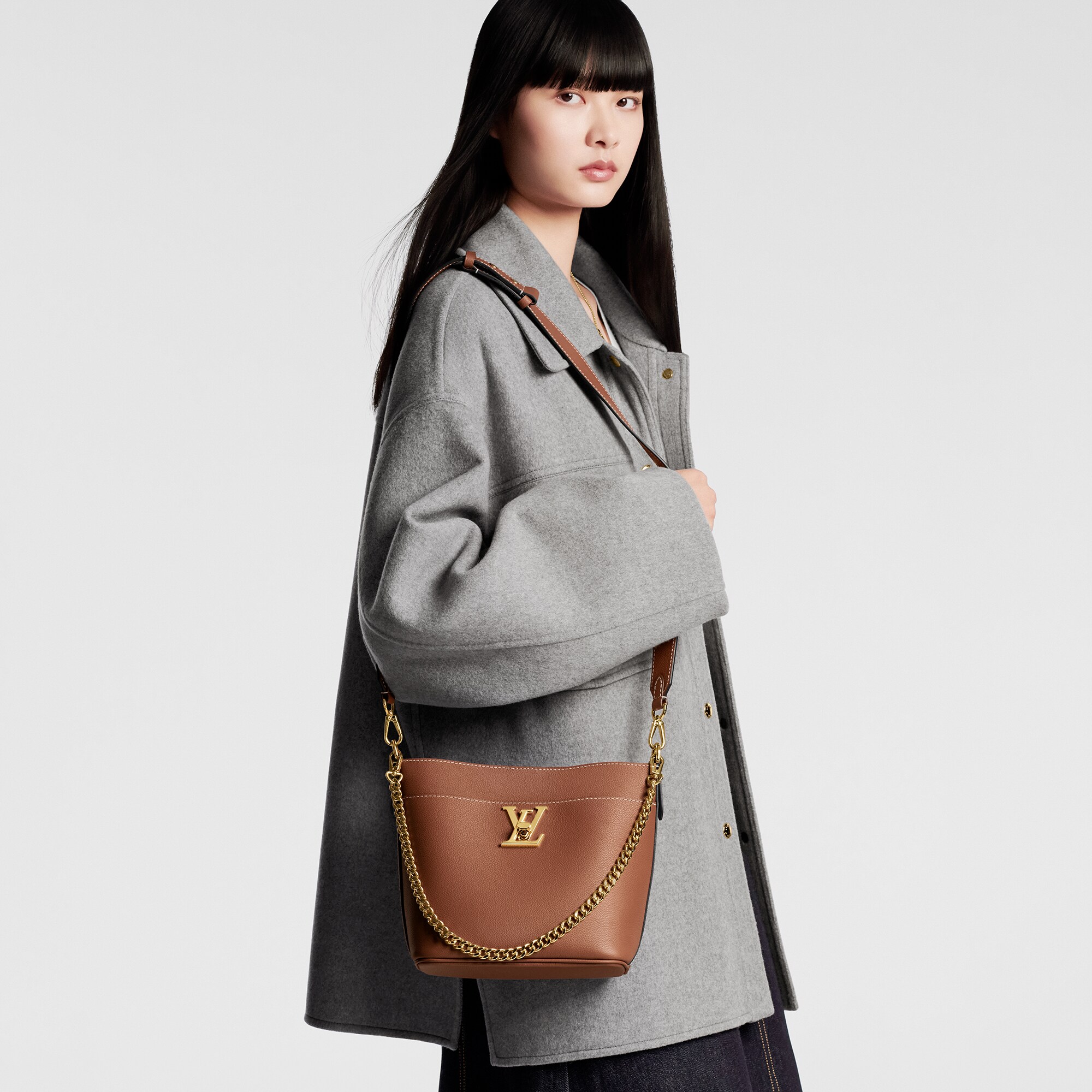 Lock and Walk Bucket Bag - Luxury Lockme Leather Brown | LOUIS VUITTON